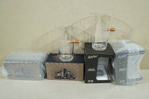 lot 107 image: 4 Lucky Shot Etched Beer Glasses Armed Citizen with Embedded Bullet