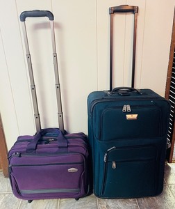 lot 68 image: Ricardo and Air Canada Rolling Travel Suitcases