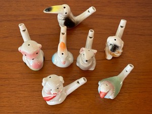 lot 87 image: Seven Fun Vintage Porcelain Whistle Figurines