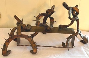 lot 95 image: Western Themed Metal Sculpture
