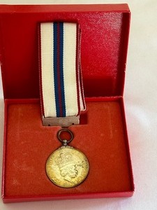 lot 12 image: Vintage Queen Elizabeth Commemorative Canadian Coin and Ribbon