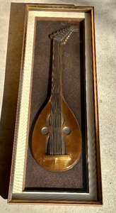 lot 9 image: Pair of Mid Century  Framed Musical Instrument Figurines