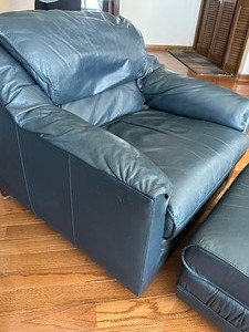 lot 6 image: Leather Craft Navy Blue Leather Chair and Ottoman