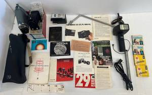 lot 39 image: Group Of Misc. Vintage Camera Items Including Camera Flashes And More