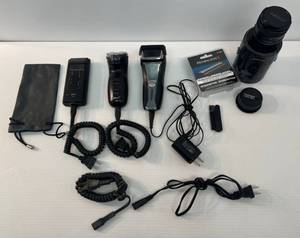 lot 175 image: Group Of Vintage Electric Shavers  And Yashica ML 28MM Lens