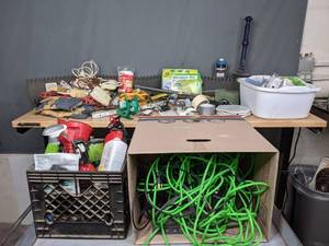 lot 277 image: Miscellaneous Garage Items - Cords, Work Gloves, Light Bulbs, Power Strips, Drop Cloth, and more M