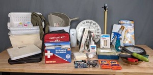 lot 262 image: Assorted Household Necessities Organizing Baskets, First Aid Kit, Syringes with Needle, Iron, Scales and Much More M