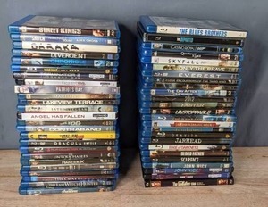 lot 57 image: Stack of (50) Blu-Ray DVDs Street Kings, Divergent, Mad Max Fury Road, Lakeview Terrace, The Fog, Dracula Untold, Hancock, The Craft, The Blues Brothers, Everest, The Day After Tomorrow, 2012, Scarface and More T