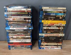 lot 59 image: Stack of (50) Blu-Ray DVDs The Wolverine, The Night Strangler, Logan, Friends with Benefits, Siberia, Snow White & The Huntsman, Life of PI, Elvis, Wild Hogs, The Boy and More T