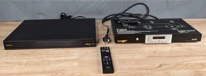 lot 96 image: Sony Ultra HD BluRayDVD Player and Monster Power HTS-1650 Home Theater PowerCenter with Clean Power Stage 2 Filtering and Remote  T