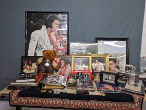 lot 306 image: Huge Elvis Memorabila Collection includes Framed Photos, Coins, Newspaper Clippings, Scrapbook, Coffee Mugs, Music, and Much More  T