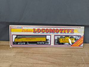 lot 343 image: Yellow Union Pacific Life-Like Deluxe Locomotive Toy  D