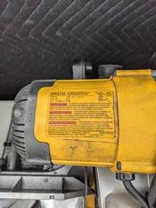 lot 2 image: DeWalt 15 Amp Corded 12 in. Compound Double Bevel Miter Saw X