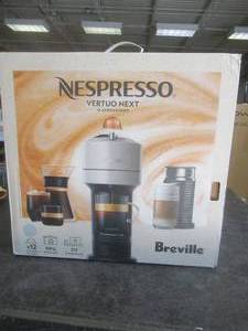 lot 10 image: Nespresso Vertuo Next Coffee and Espresso Machine by DeLonghi with Milk Frother in White (OPEN BOX)