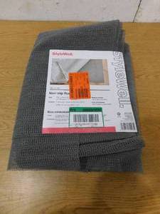 lot 24 image: StyleWell Deluxe 8 ft. x 10 ft. Rug Gripper Pad