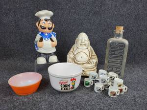 lot 349 image: Eclectic Mix of Home Dcor - Ceramic Buddha, Ceramic Chef Utensil Holder, Anchor Hocking Bowl, and More