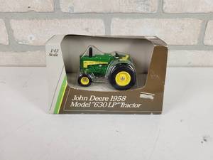 lot 218 image: ERTL John Deere 1958 Model 630LP Diecast Tractor Model - 143 Scale