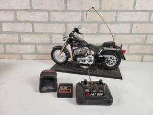 lot 234 image: New Bright Harley Davidson Fat Boy RC Motorcycle - Includes Motorcycle, Controller, Charger and Battery