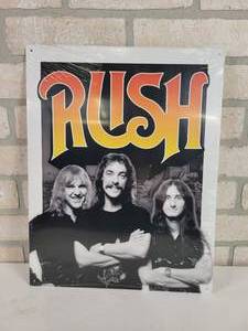 lot 279 image: NEW RUSH Metal Sign - 12.5 x 16