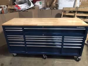 lot 1 image: Husky 72 in. W x 24 in. D Standard Duty 18-Drawer Mobile Workbench Tool Chest with Solid Wood Top in Gloss Blue customer return review pictures