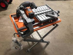 lot 6 image: RIDGID 7 In Wet Tile Saw with Stand customer returns  see pictures