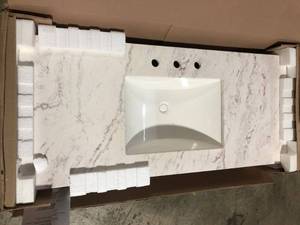 lot 27 image: Home Decorators 49 in. W x 22 in. D Stone Effects Cultured Marble Vanity Top in Lunar with Undermount White Sink