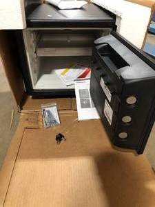lot 45 image: SentrySafe  0.8 cu. ft. Fireproof & Waterproof Safe with Dial Combination Lock customer return review pictures