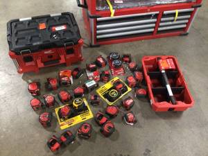lot 3 image: Mix Lot of Milwaukee Items incluedes Storage Tool Chest with Tape Measures and Storage Box, Customer returns, Review al pictures