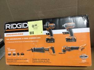 lot 8 image: Ridgid 18V Brushless Cordless 4-Tool Combo Kit with 2 Batteries, and Tool Bag used  customer return review pictures