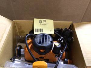 lot 34 image: Triton TRA001 3-14 HP Dual Mode Precision Plunge Router customer return review pictures