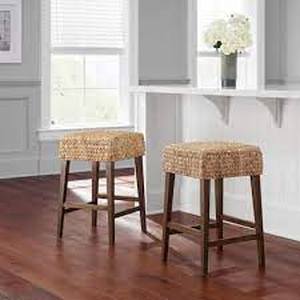 lot 12 image: Home Decorators Collection Backless Natural Beige Woven Hyacinth Counter Stool with Walnut Legs