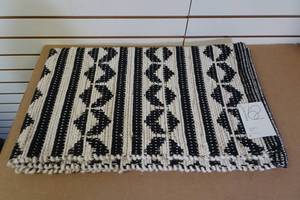 lot 21 image: New Project 62 Accent Rug -BlackIvory