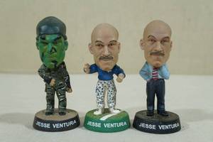 lot 130 image: 3 Jesse Ventura Mini Big Head Figures