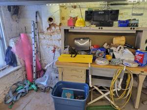 Large Lot of Assorted Garage Items, New Rolls of Romex House Wire, Long Power Strips, Radios, Hardhat, Roll of Plastic, Straps, Power Tools, Extension Cord and More