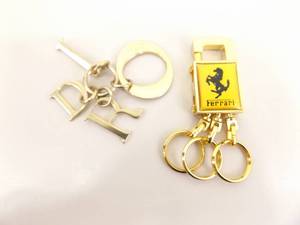 lot 12 image: Authentic Vintage Christian Dior and Ferrari Key FOBs