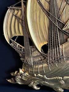 lot 77 image: Gold Colored Pirate Ship on the Water 3D Wall Decor