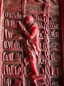 lot 119 image: Antique Red Wax Carving Man in the Library