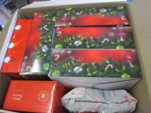 lot 115 image: box of new christmas wreaths , gnom...