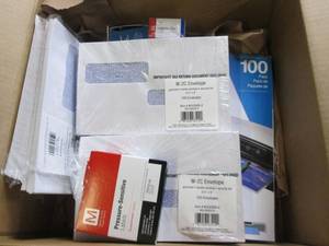 lot 216 image: box of envelopes laminating pouches...