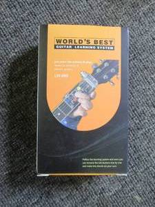 lot 382 image: worlds best guitar learning system...
