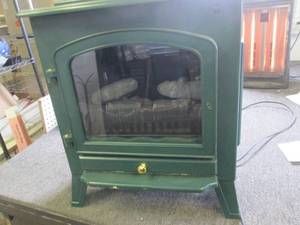 lot 396 image: electric heater...