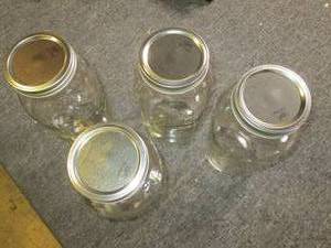 lot 420 image: 4 half gallon canning jars and lid...