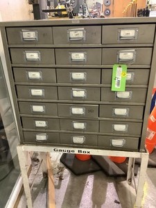 lot 1023 image: Storage Gauge Box