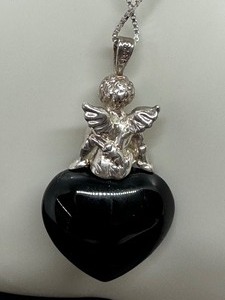 lot 112 image: Lovely Black Onyx Heart and Sterling Cherub Necklace