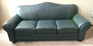 lot 11 image: Klaussner True Nature Forest Green Leather Sofa