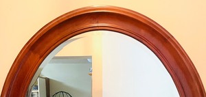 lot 55 image: Wooden Framed Oval Wall Mirror