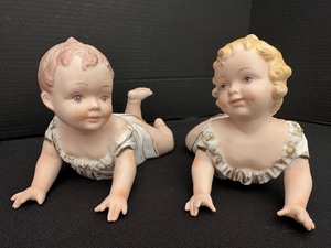 lot 142 image: Pair of Vintage Ceramic Piano Babies