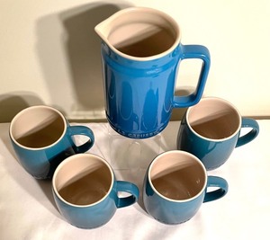 lot 255A image: Le Creuset Petite Pitcher and 4 Mugs