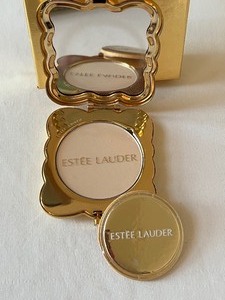 lot 169 image: Este Lauder Sagittarius Lucidity Compact