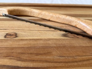 lot 272 image: Appalachian Bow Saw Knife by Robert Linn and Large Cutting Board